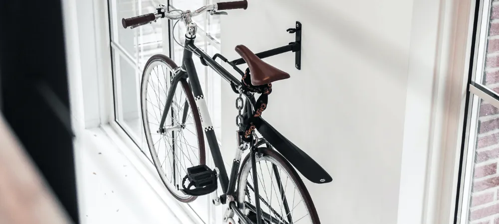 horizontally attached bike on the wall